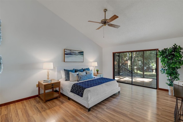 bedroom featuring ceiling fan, high vaulted ceiling, a textured ceiling, access to outside, and light wood-type flooring