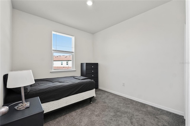 bedroom featuring carpet