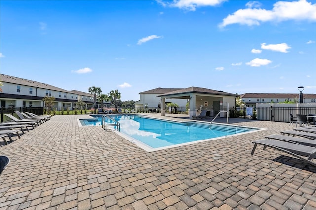 view of swimming pool featuring a patio