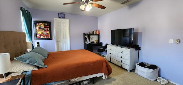 bedroom featuring light colored carpet and ceiling fan