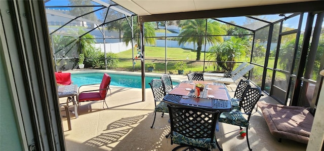 view of swimming pool featuring a lanai, a water view, and a patio