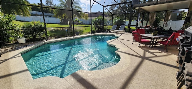 view of swimming pool featuring a patio area