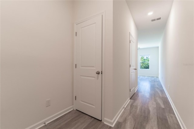 hall with light wood-type flooring