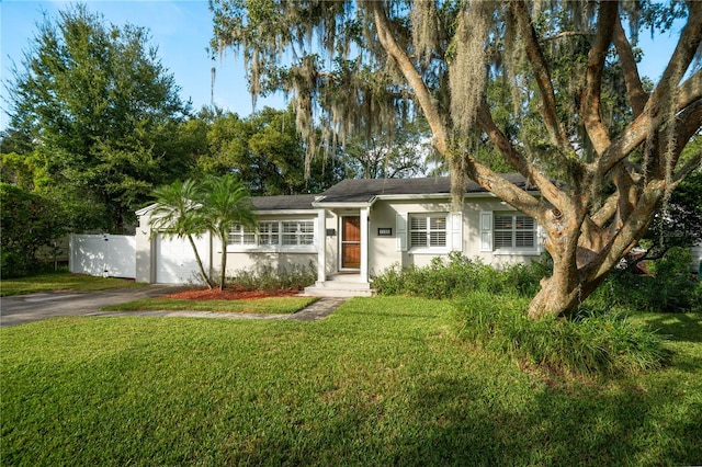 view of front of home with a front lawn