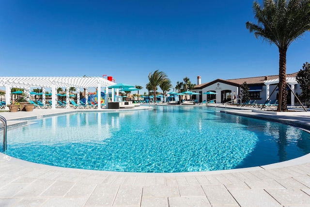 view of pool with a pergola