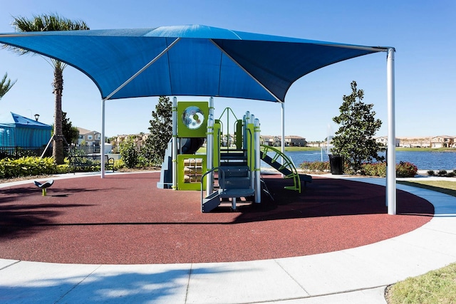 view of play area with a water view