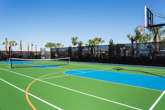 view of basketball court featuring tennis court