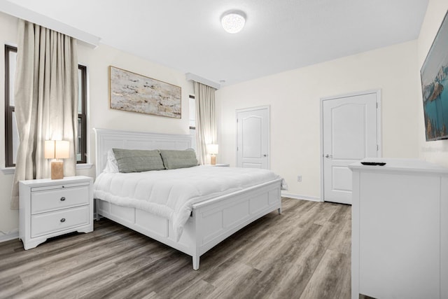 bedroom featuring light wood-type flooring