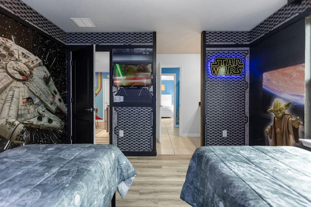 bedroom featuring hardwood / wood-style floors