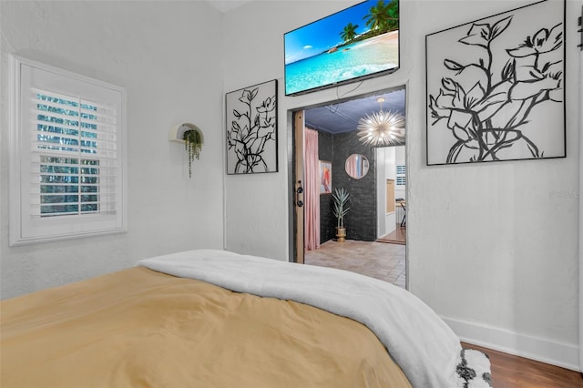 bedroom featuring wood-type flooring