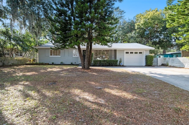 single story home featuring a garage