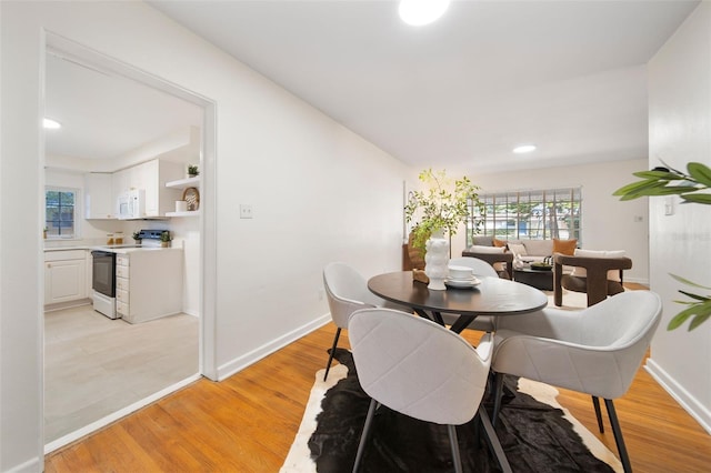 dining area featuring light hardwood / wood-style floors