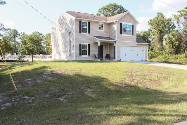 front facade with a front yard and a garage