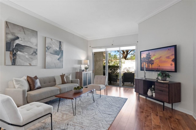 living room featuring crown molding and hardwood / wood-style floors