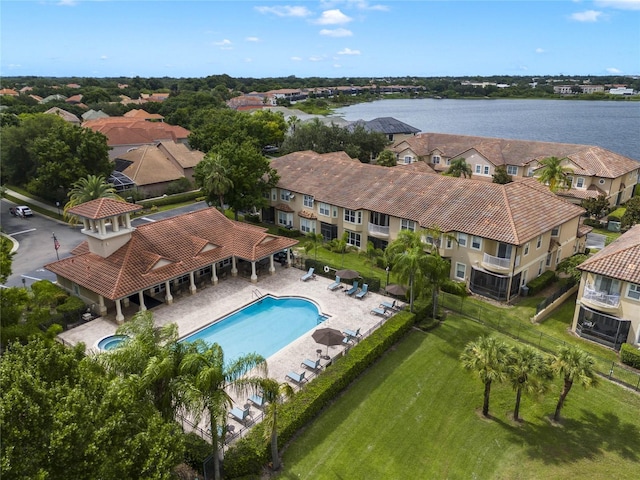 birds eye view of property featuring a water view