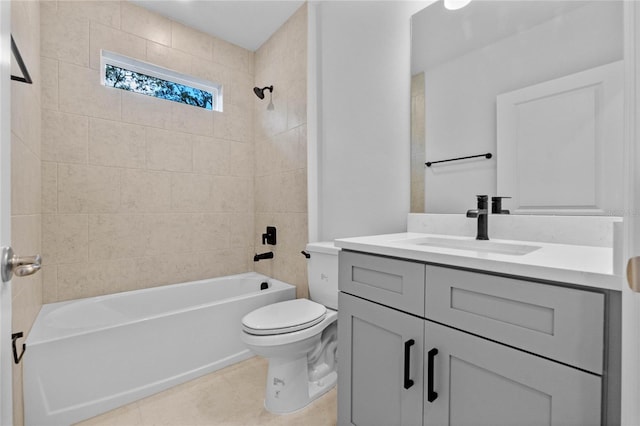 full bathroom with vanity, toilet, tile patterned floors, and tiled shower / bath combo