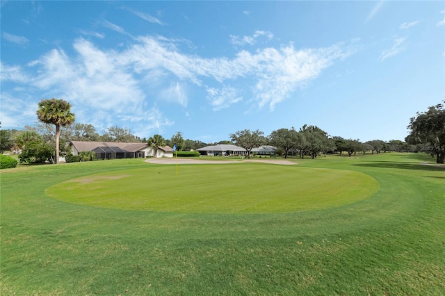 view of community featuring a yard