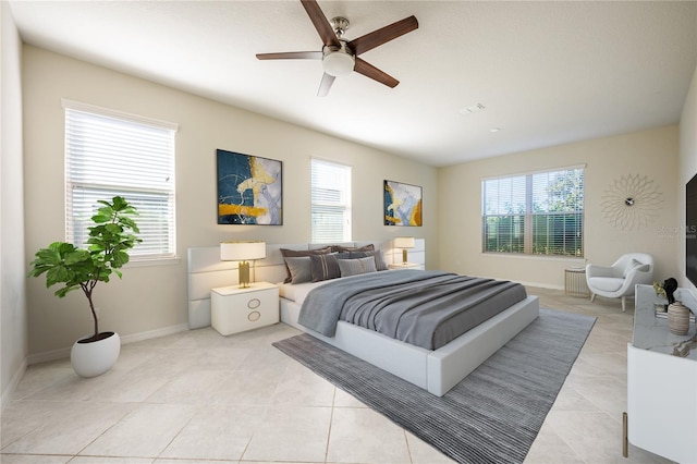 bedroom featuring ceiling fan, light tile patterned flooring, and multiple windows