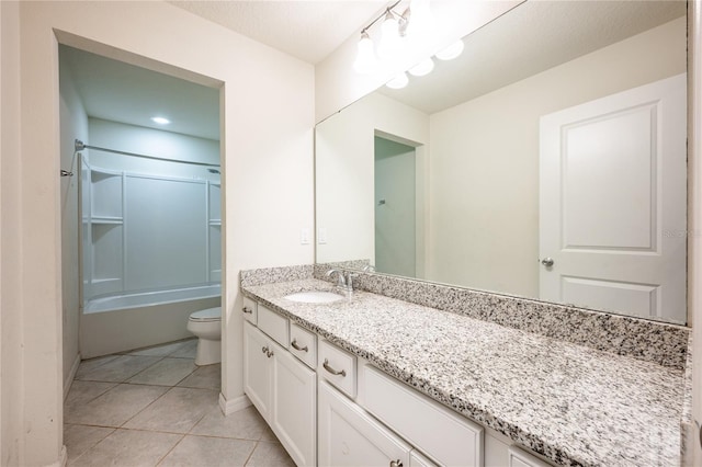 full bathroom with tile patterned flooring, vanity, shower / bathtub combination, and toilet