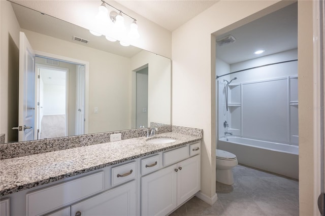 full bathroom featuring bathing tub / shower combination, tile patterned flooring, vanity, and toilet