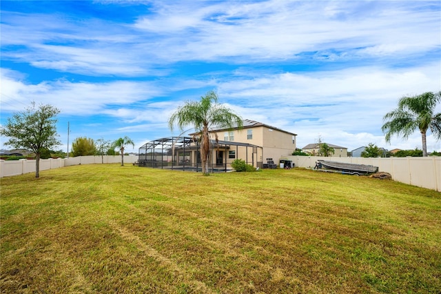 view of yard featuring a lanai