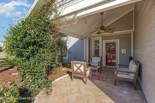 view of patio featuring ceiling fan