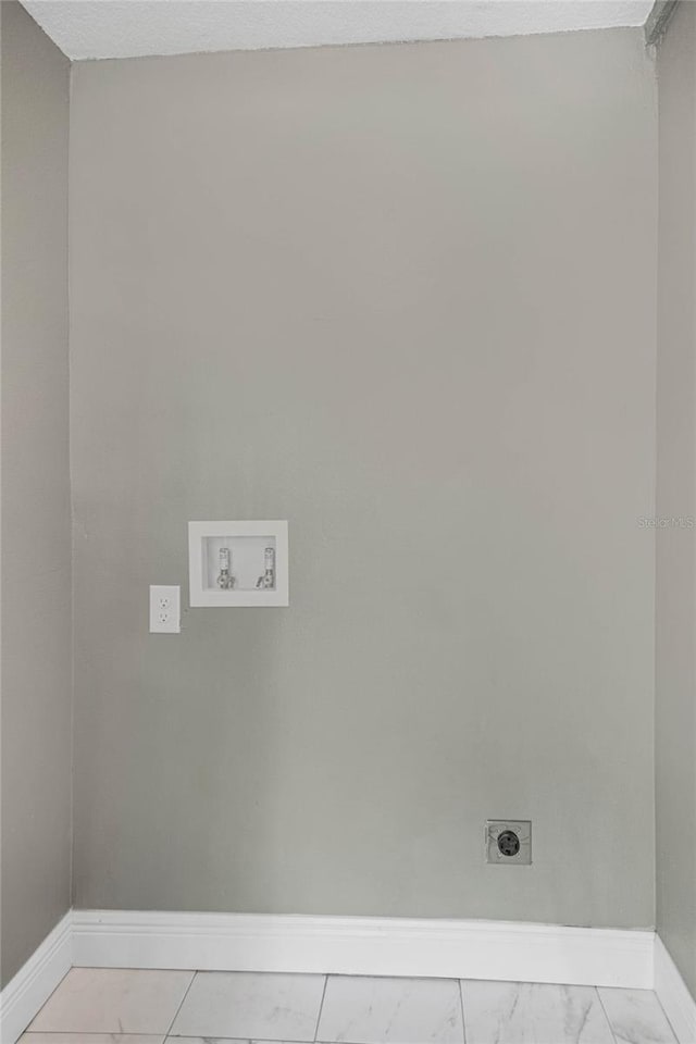 laundry room with washer hookup and hookup for an electric dryer