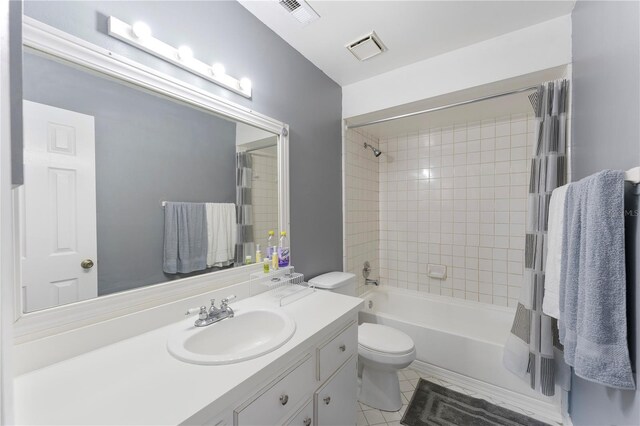 5208 Via Hacienda Cir Unit 201, Orlando, FL 32839 - full bath with vanity, toilet, shower / tub combo, and tile patterned floors