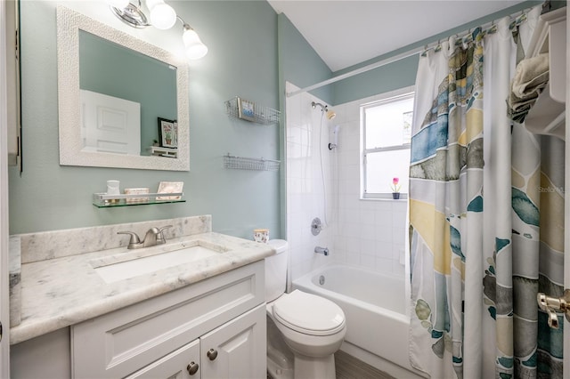 full bathroom with toilet, vanity, and shower / tub combo with curtain