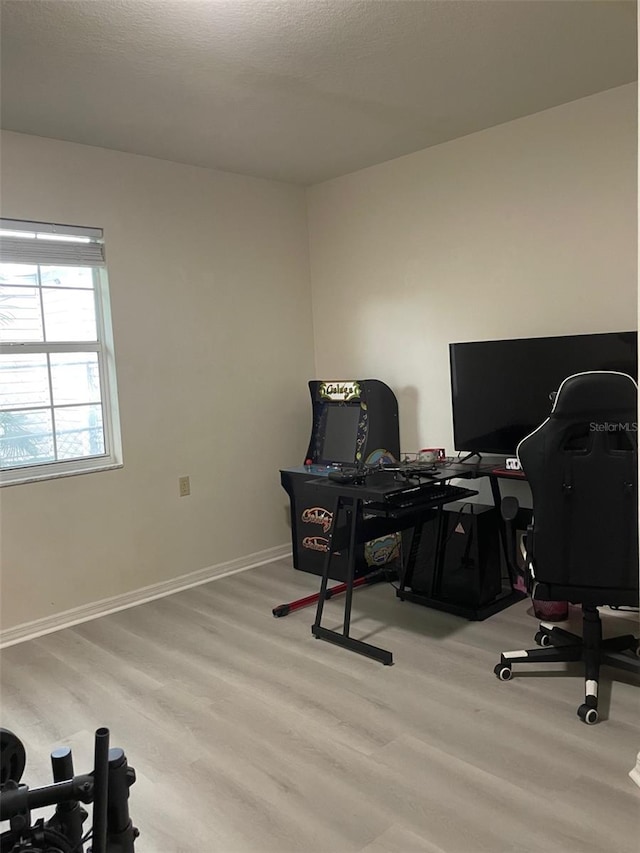 office space with light hardwood / wood-style floors