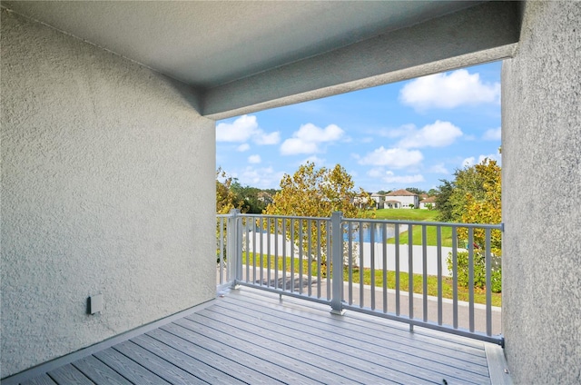 deck featuring a water view