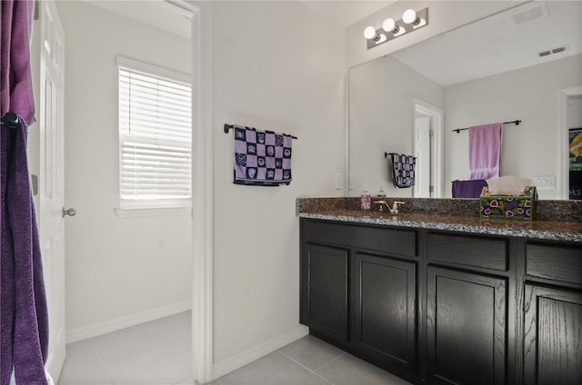 bathroom featuring vanity and tile patterned floors