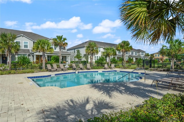 view of swimming pool featuring a patio area