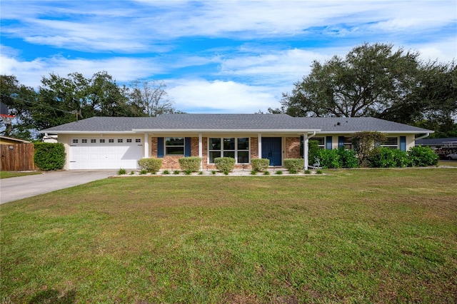 ranch-style house featuring a garage and a front yard