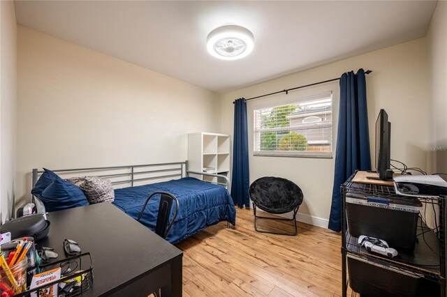 bedroom with light hardwood / wood-style flooring