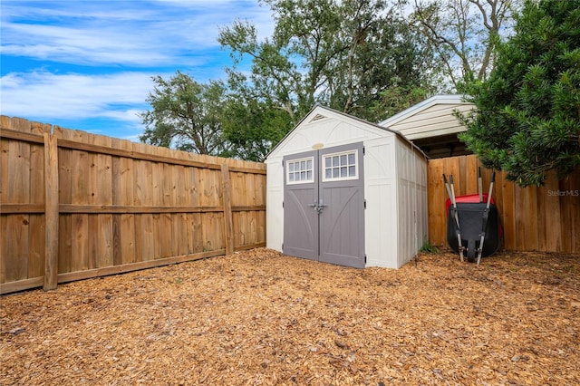 view of outbuilding featuring a carport