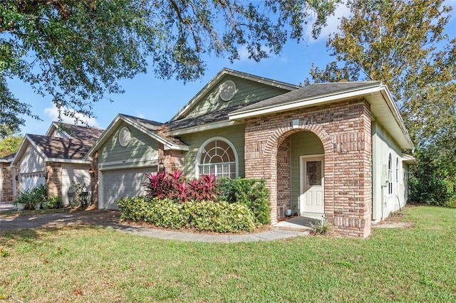 view of front of house featuring a garage and a front lawn