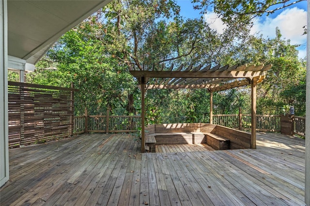 wooden terrace with a pergola