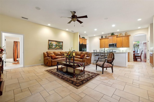 living room with ceiling fan