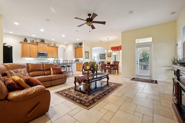 living room featuring ceiling fan