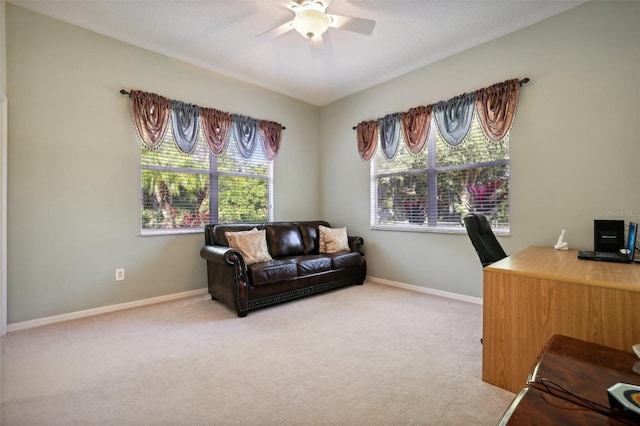 office featuring plenty of natural light, carpet floors, and ceiling fan