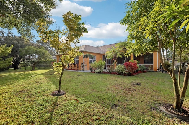 view of front of property with a front lawn