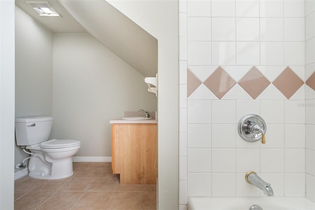 full bathroom with tile patterned floors, vanity, toilet, and washtub / shower combination