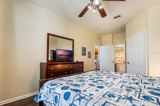 bedroom with ceiling fan and dark hardwood / wood-style flooring