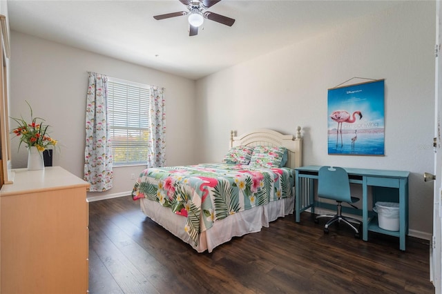 bedroom with ceiling fan and dark hardwood / wood-style floors