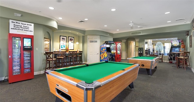 recreation room featuring billiards, dark colored carpet, indoor bar, ornamental molding, and ornate columns