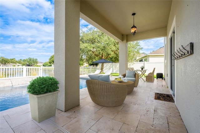 view of patio with a fenced in pool