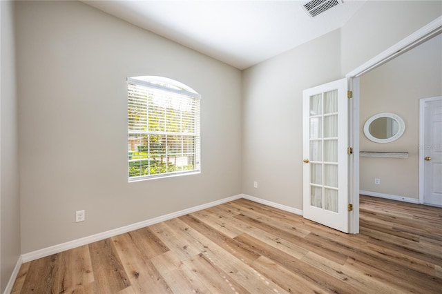 unfurnished room featuring light wood-type flooring