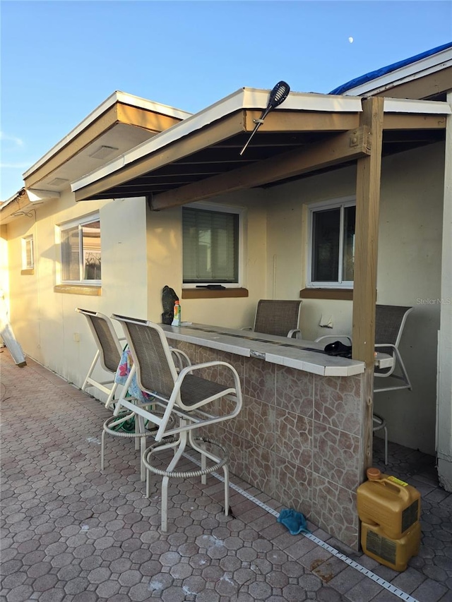 view of patio / terrace with an outdoor bar