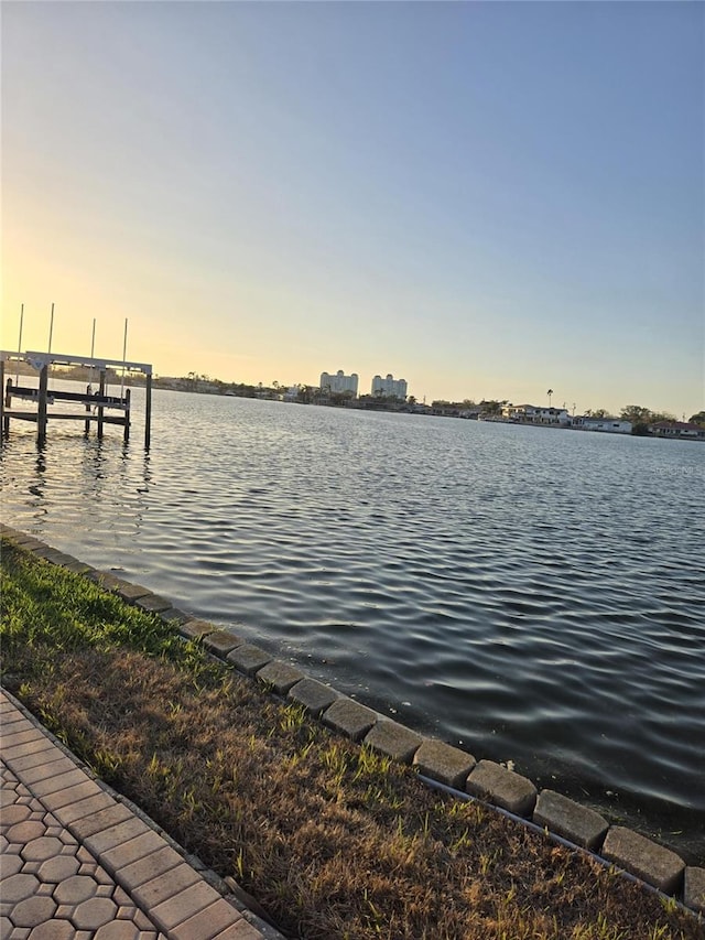 dock area featuring a water view